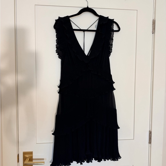 Zimmermann Dresses & Skirts - Zimmermann Black Ruffle Tiered Mini Dress.
Authentic